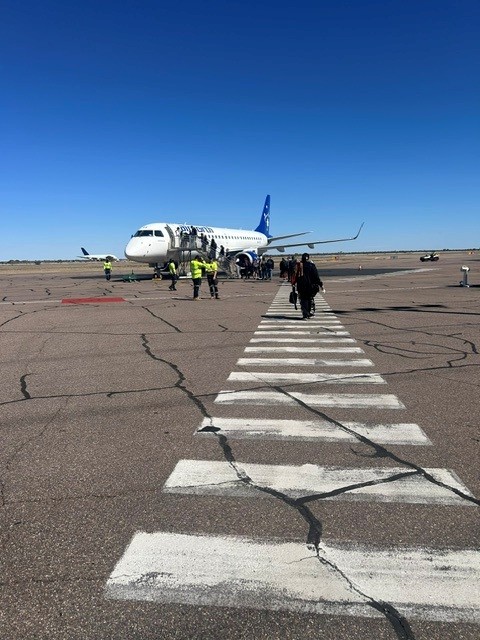 Boarding the plane on the tarmac